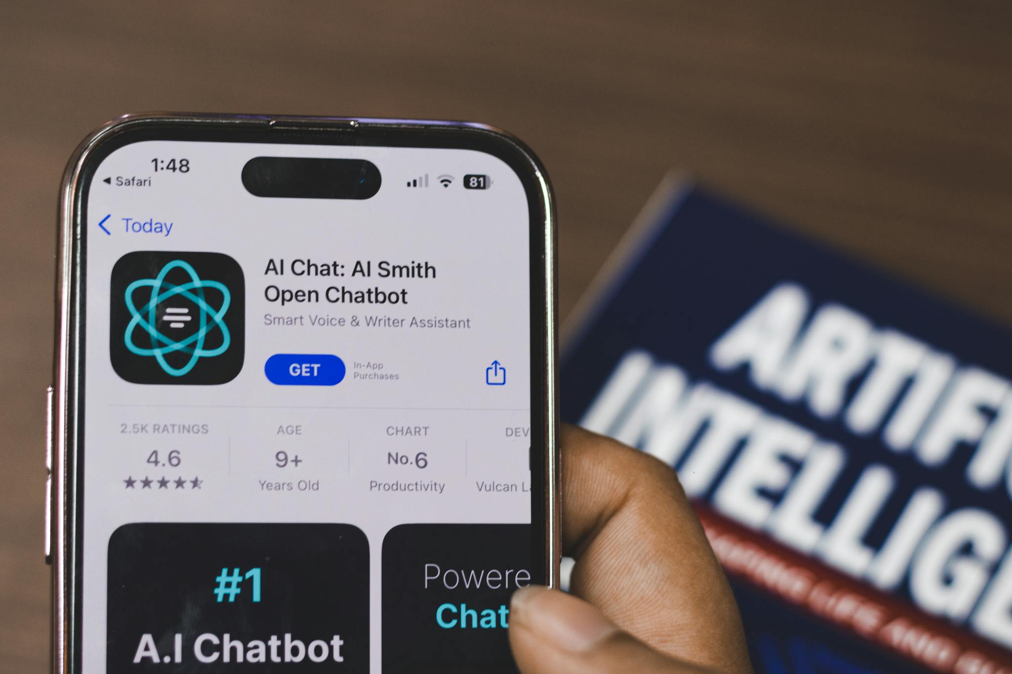 Hand Holding A Smartphone With Ai Chatbot